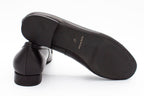 Black leather loafers with buckle