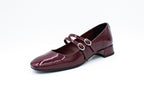 Decolleté in vernice con due cinturini bordeaux