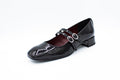 Patent leather court shoes with two straps
