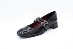 Patent leather court shoes with two straps