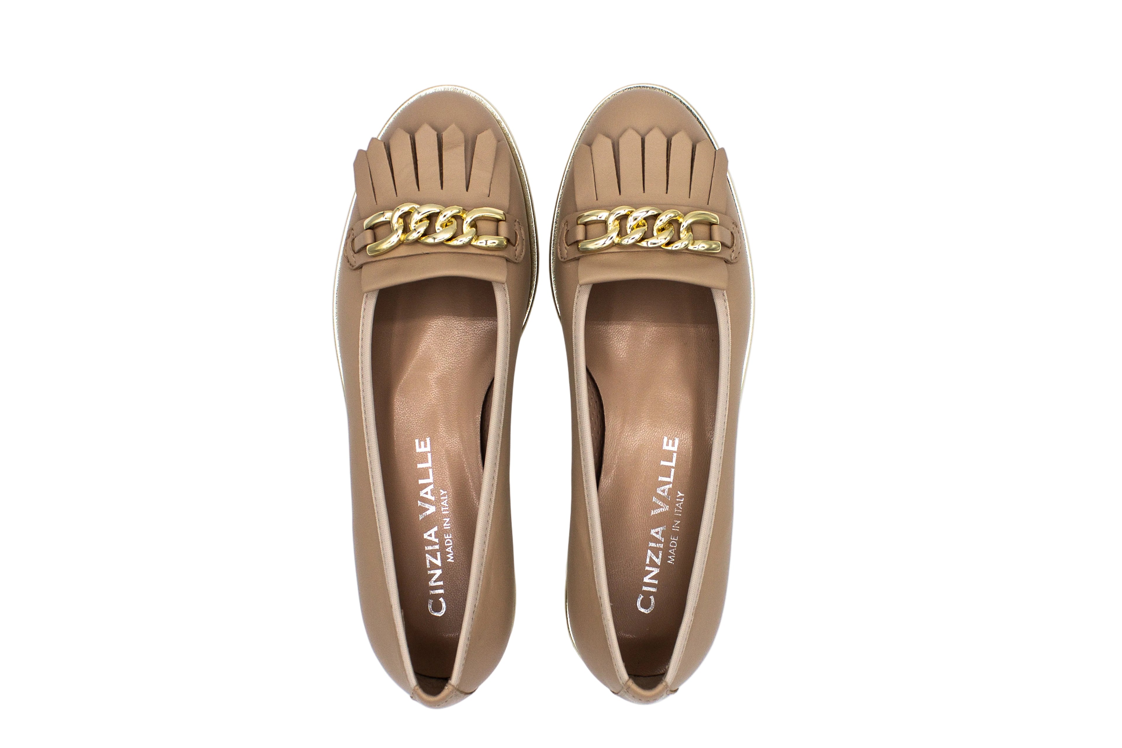 Beige leather loafers with fringe