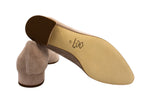 Pointed loafers with beige suede buckle