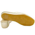 Pantofole con zeppa in nappa platino