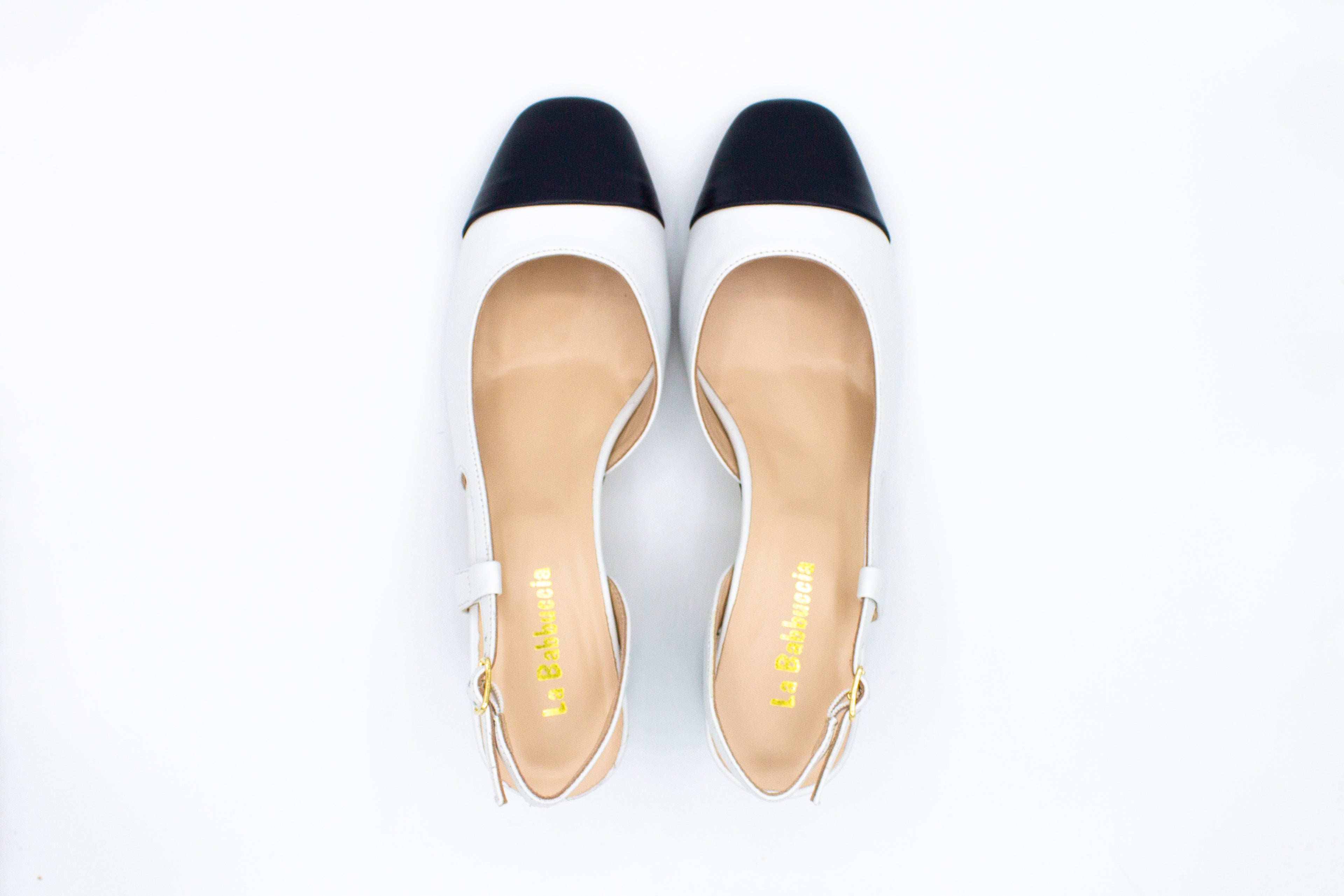 Slingback in pelle con punta a contrasto bianco blu